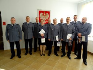 Zdjęcie przedstawia jubilatów wraz z kierownictwem jednostki